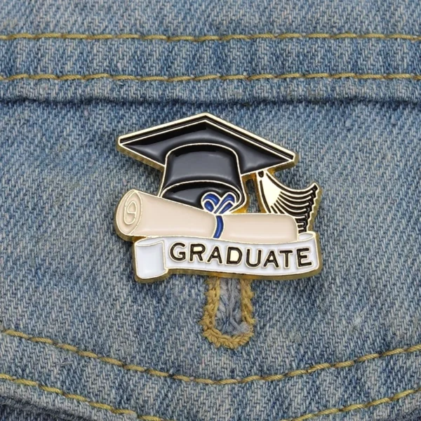 cn-11134207-7r98o-ls6exufpc0kda9.webp Graduation Enamel Bagpack Pin