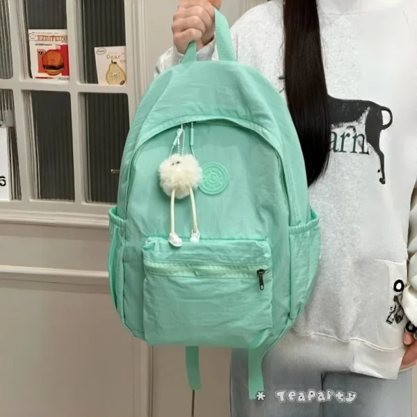 cn-11134207-820l4-mhyexe0ddmh0fa.webp Lightweight Solid Color School Backpack