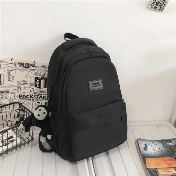 sg-11134201-7rfg1-m3j4qoab0ybsbb.webp Solid Color Student Backpack